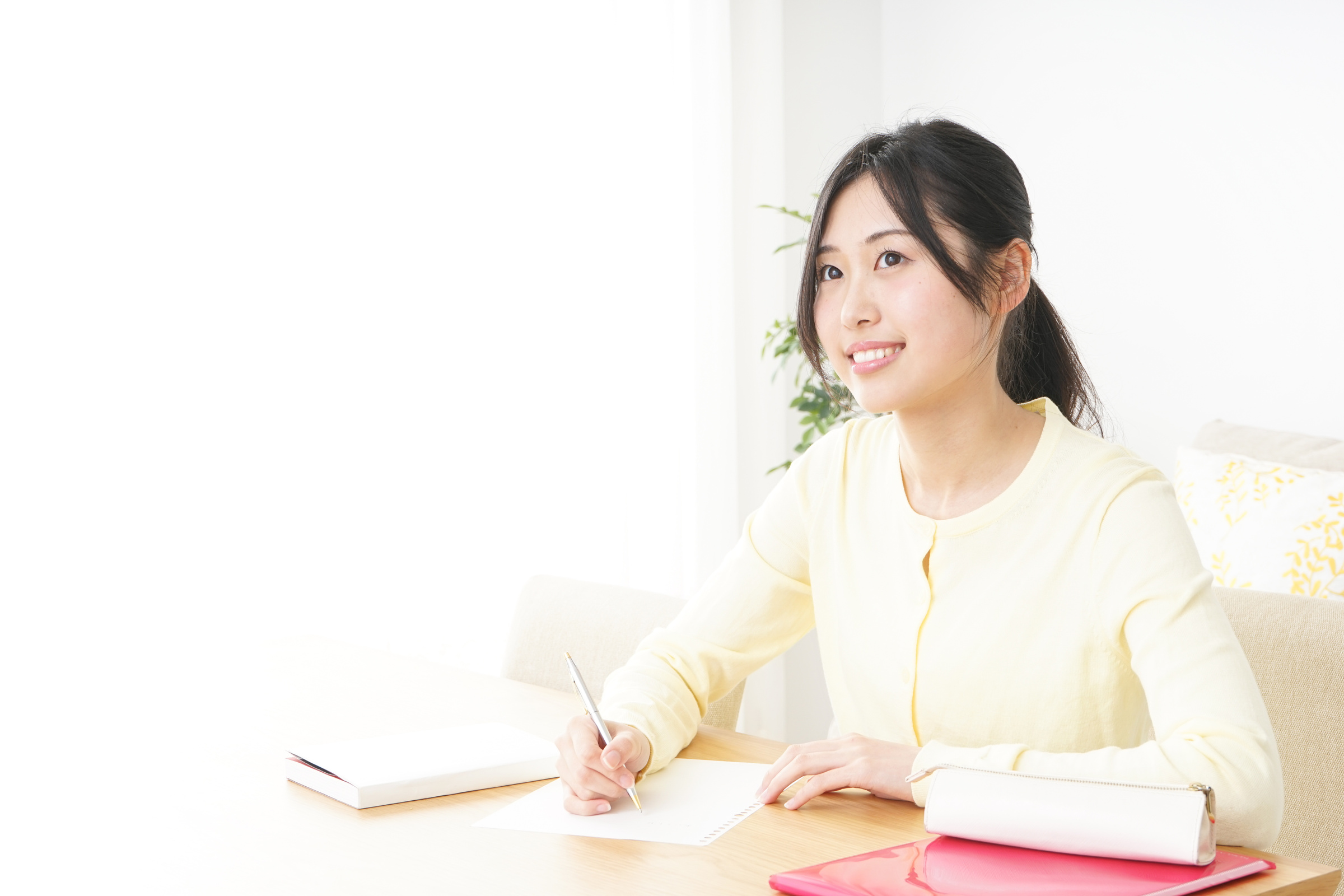 Young woman studying at home